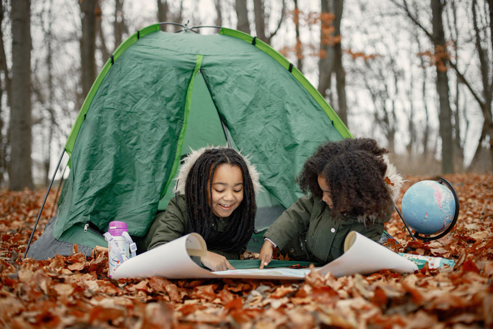 two girls with map